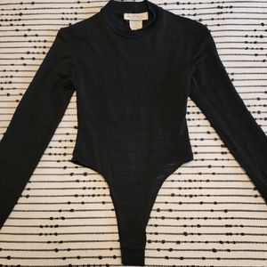 Le Chateau Semi Sheer Thong Bodysuit